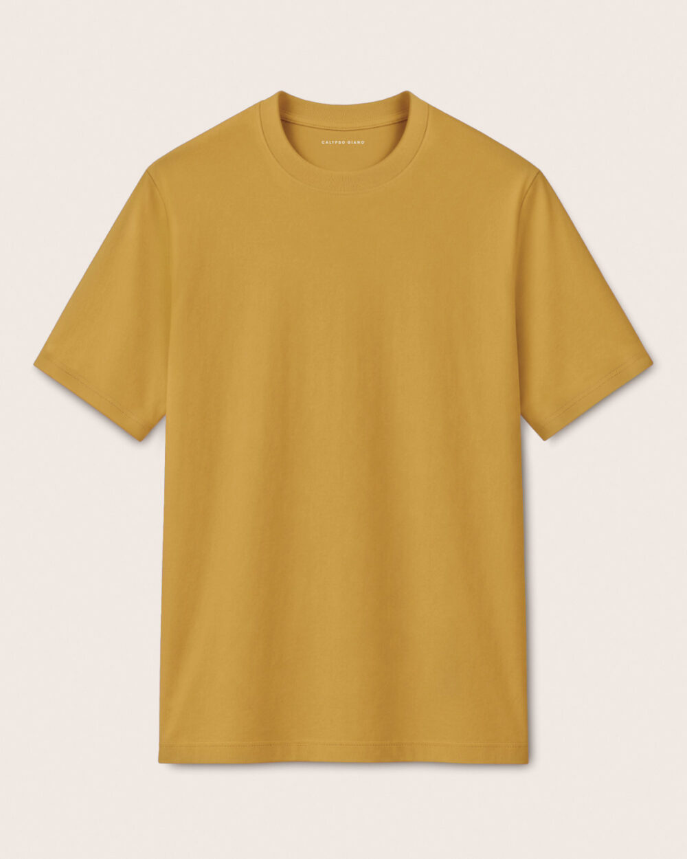SENSE T-Shirt von CALYPSO GIANO in Ochre als Produktfreisteller auf hellem Hintergrund.